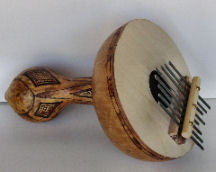 African thumb piano created from bottle gourd and metal tines